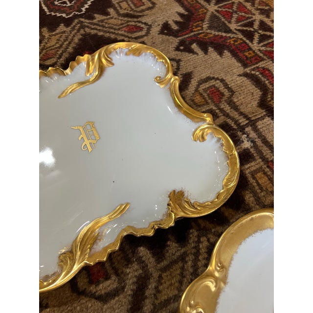 Up for consideration is a beautiful vintage pair of white and gold monogrammed ceramic plates. These would look lovely in...
