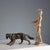 Bronze sculpture depicting a hunting dog. This piece is attributed to the mentioned designer/maker. It has no attribution...