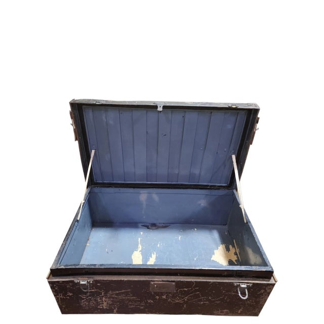 Late 19th century English Victorian era metal military trunk with original fittings and handles. Interesting pieces of...