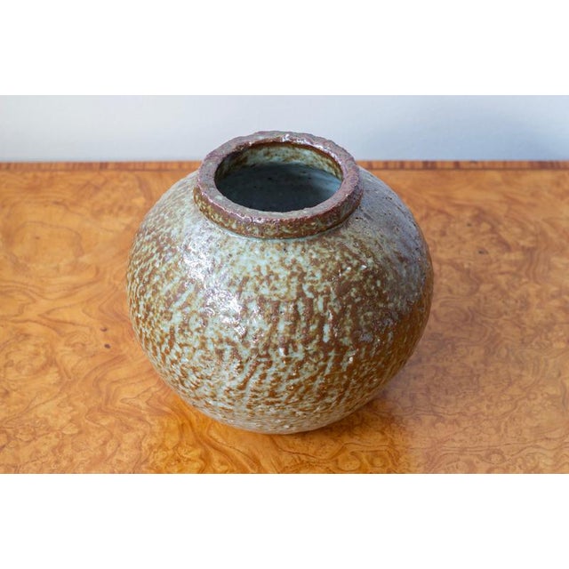Large chamotte stoneware vase designed by Gunnar Nylund. Hand made at Rörstrand in Sweden during the 1930s. Round vase...