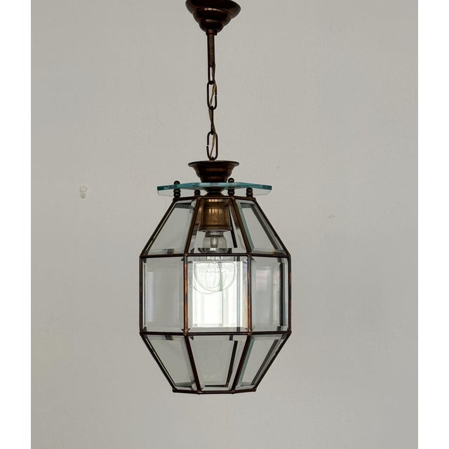 Beautiful old lantern or pendant lamp made of shiny crystal cut glass and full brass lamp frame. Hand-Crafted in the...