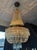 Vintage Chandelier- Extraordinary French Montgolfière Empire-Brass & Crystal Basket Chandelier An exquisite French Empire...