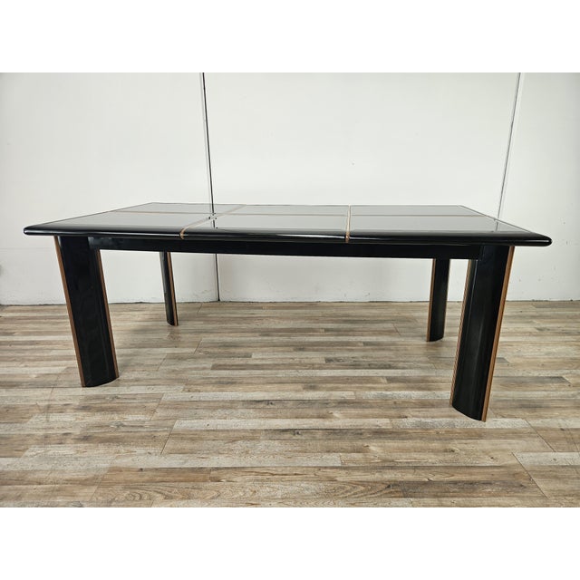 Exclusive and refined extendable dining table by Pierre Cardin, an icon of 1970s design and luxury furniture. This piece...