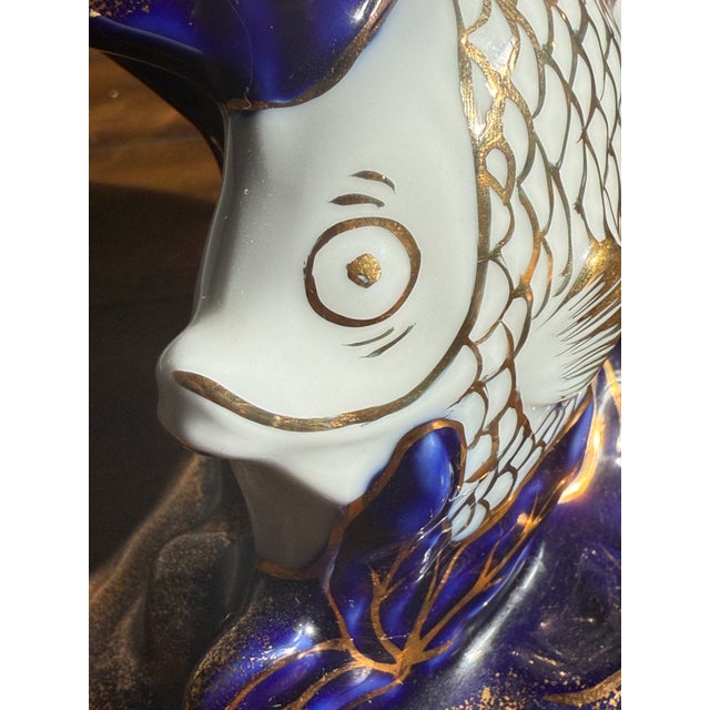 Limoges France cobalt blue compote on rare figural fish pedestal. Five Fragonard-style romantic medallions, raised gold...