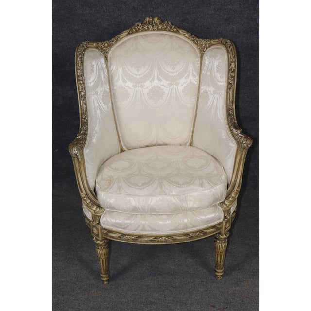 Early 20th Century French Louis XVI Creme Painted Tall Back Heavily Carved Bergere Chair For Sale - Image 5 of 12
