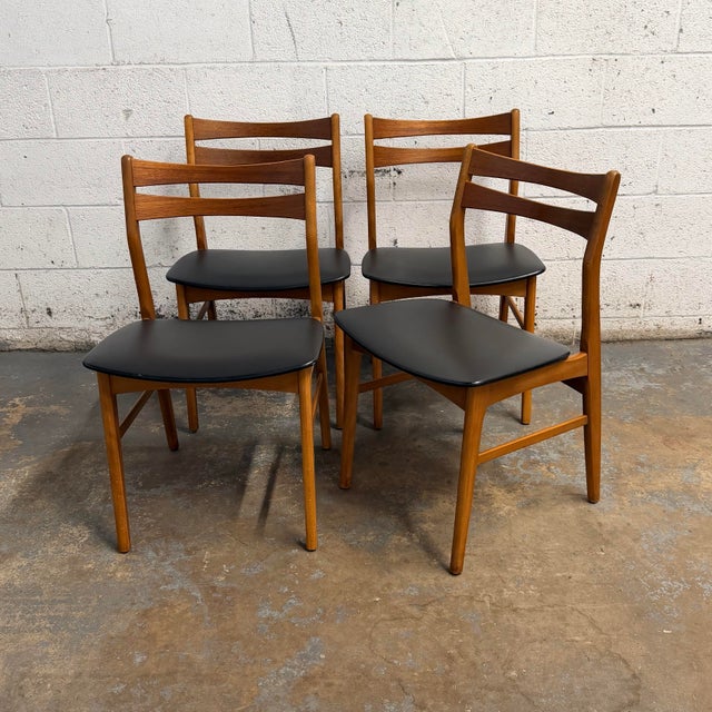 This set of Danish teak dining chairs made in the Boltinge Stolefabrik are absolutely gorgeous. With beech frames, teak...
