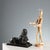 Sculpture depicting a sphinx on a rectangular base. This piece is attributed to the mentioned designer/maker. It has no...