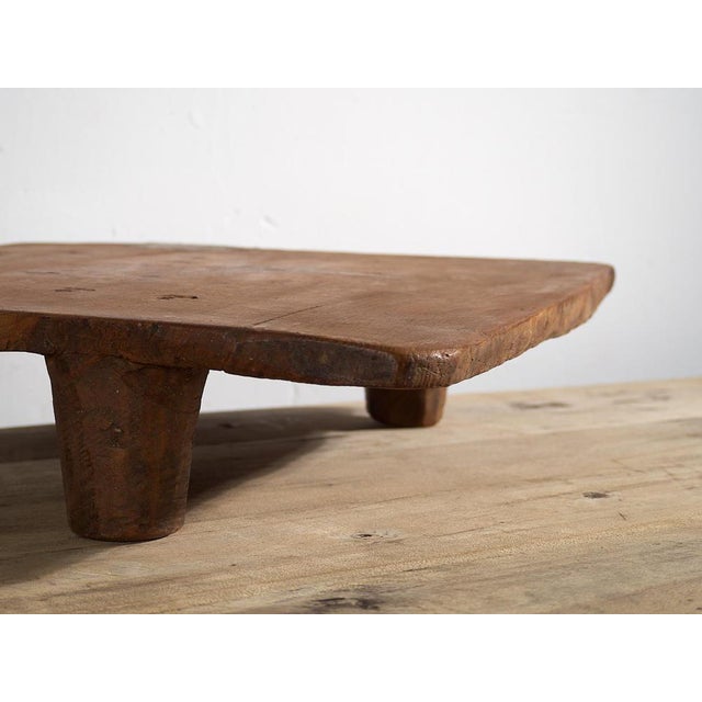 Antique primitive style wooden table (c.1920) Dimensions: Width: 78 cm Depth: 57 cm Height: 16 cm Style: Rustic Materials...