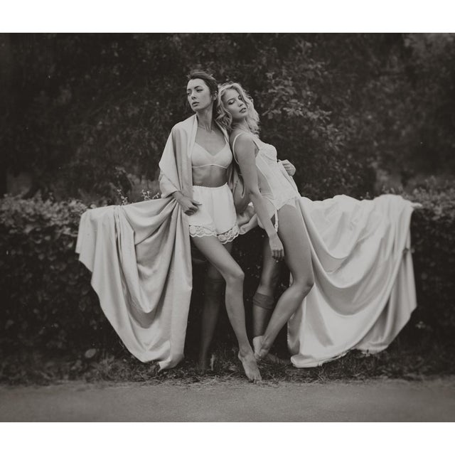 English Tea by Dasha and Mari Over the hedge, two models drape their dresses over a hedge. Limited edition print (edition...