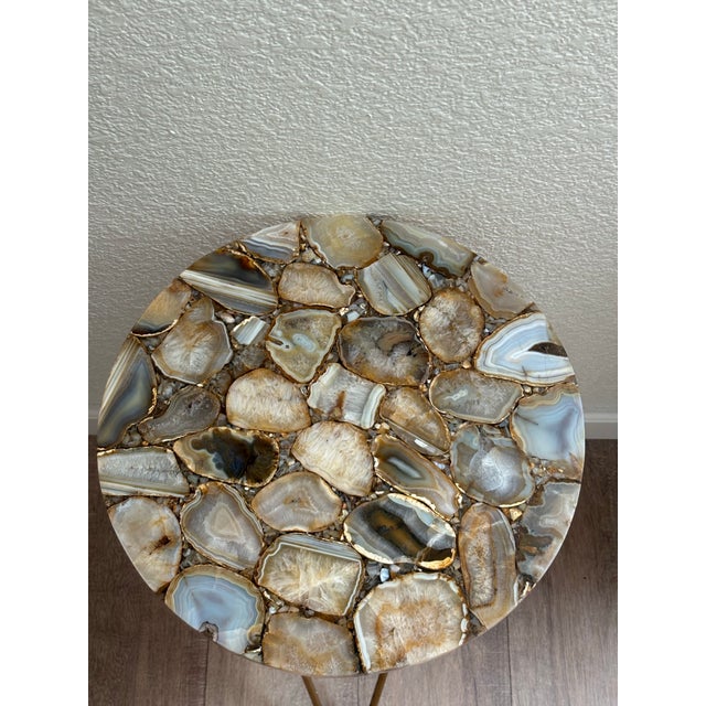 Natural stone Brazilian mixed agates inlays in a large round tabletop on geometrical brass metal legs. Excellent condition...