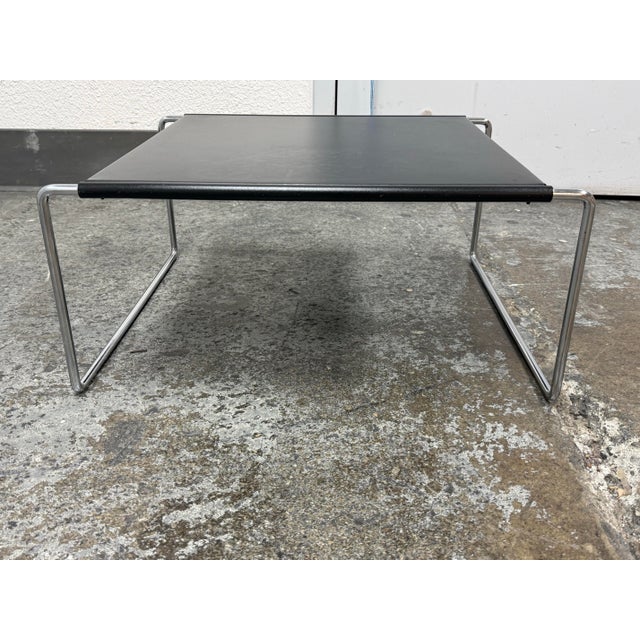 Design Plus Gallery presents a Side Table in the Style of Marcel Breuer. The table pairs a tubular chrome frame with a...
