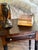 An exceptional mid-19th-century American Empire style drop-leaf work table / nightstand dating to circa 1840–1860. Carved...