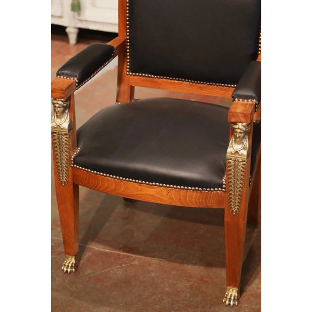 Decorate a man’s office or study with this elegant Empire armchair. Hand-carved in France circa 1890 and built of solid...