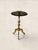 A brass kettle stand with a pie-crust rim, turned pedestal, and cabriole tripod legs. This is Georgian craftsmanship at...