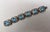 1950s Vintage Signed Napier Book Piece Silvertone & Faux-Aquamarine Link Bracelet For Sale - Image 5 of 9