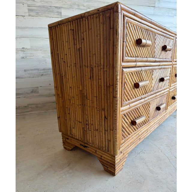 Vintage bamboo and rattan 6 drawer dresser with chevron pattern motif.