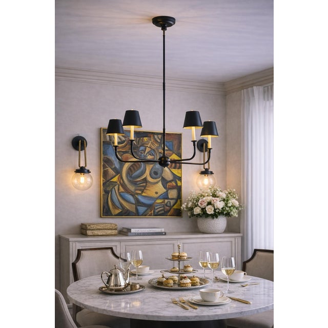 The Piaf Chandelier by Thomas O’Brien for Visual Comfort Signature is a refined balance of modern minimalism and classical...