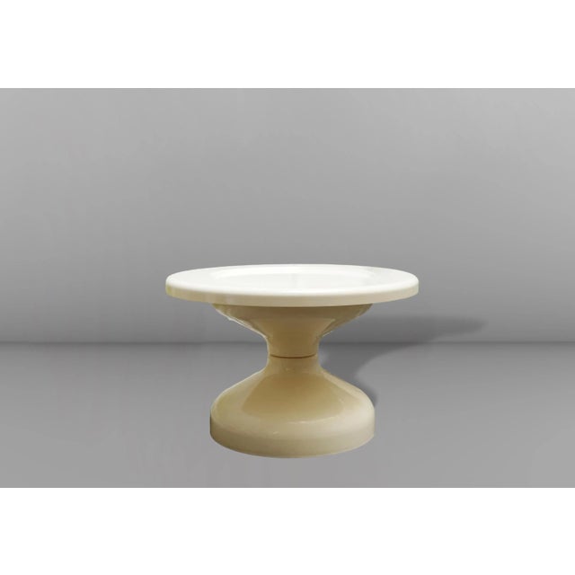 Rare coffee table Mod. "Rocchetto," designed by Achille & Pier Giacomo Castiglioni for Kartell and made of ivory ABS...
