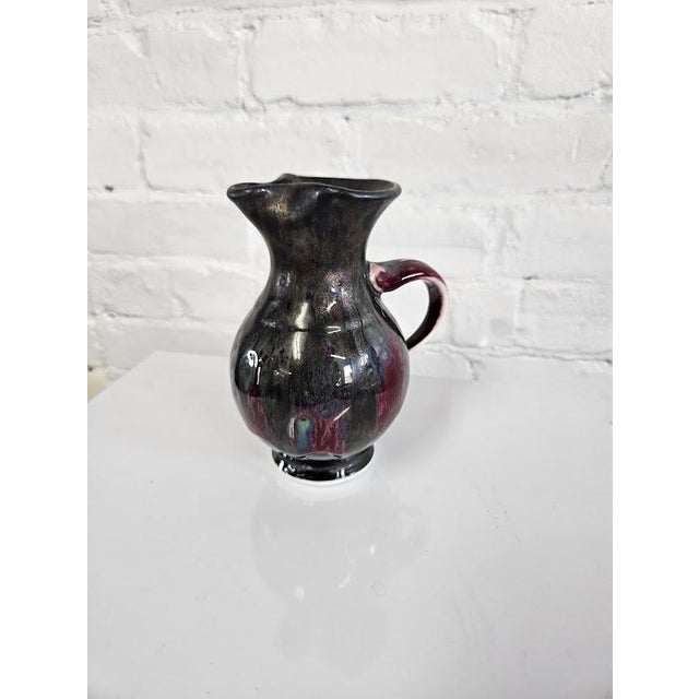 Hand-thrown porcelain small traditional pitcher crafted by the renowned Edgecomb Potters out of coastal Maine. Following...