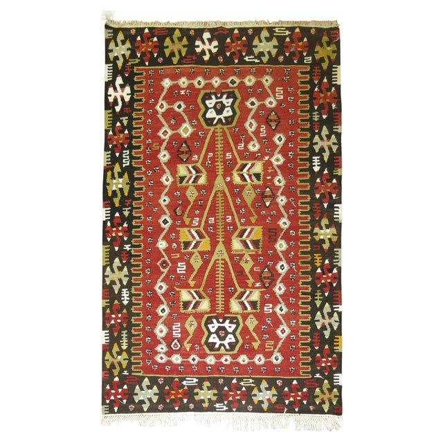Mid 20th century Turkish Kilim with a Geometric Pattern in great condition Measures: 3'6'' x 5'5''.