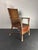 Extremely rare example of an oil cloth upholstery technique applied to an an original Art Deco rattan colonial armchair (...