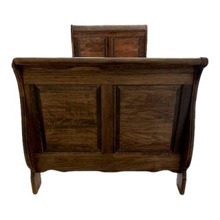 French Country Walnut-Stained Wood Twin Sleigh Bedframe For Sale