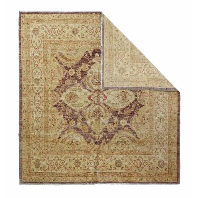 This Pakistan scatter shows a striated abrash red field centered by a large palmette cross, with fractional medallions in...