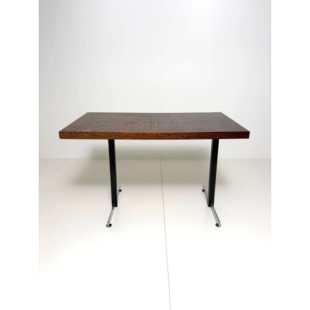 Expressive vintage table with a striking mosaic tabletop made of numerous small end-grain wood elements. The finely...