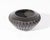 A blackware vessel by the Santa Clara artist Hanna Jay Kinlicheni. This vessel has a raised stylized feather repeated...
