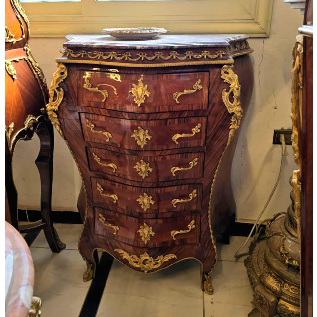 Elevate your interior with this exquisite French Bombe Lingerie Chest, a luxurious storage piece featuring a dramatic...