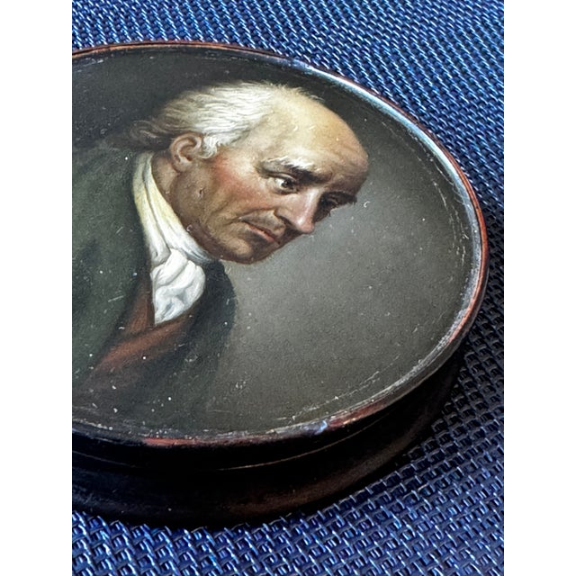 19th Century Circular Hand-Painted Ebonized Box Depicting an Aristocrat Man 4" x .75"