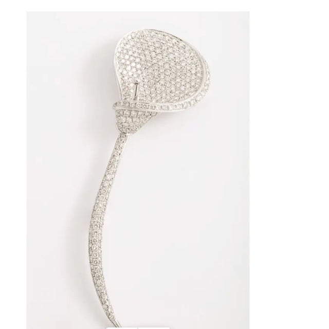 Lovely Diamond Calla Lilly Brooch. Platinum and White Gold construction. Circa. 1980 Platinum and 18kt WhiteGold Weight...