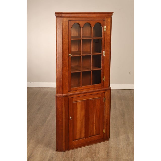 High Quality American Made Cherry Corner Cabinet In The Federal Style Featuring A Two Part Form With A Glazed Upper Door...