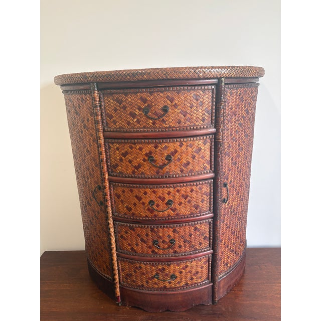 Older rattan bar or cabnit having 5 drawers and 2 side doors this is an amazing bit, it has so many places it would fit....