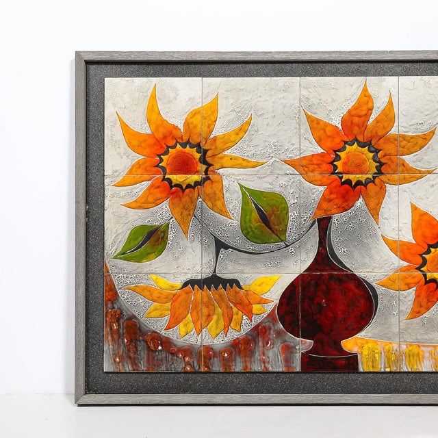 A striking example of mid-20th-century modernism, this ceramic tile wall plaque by Gilbert Valentin, created in France...