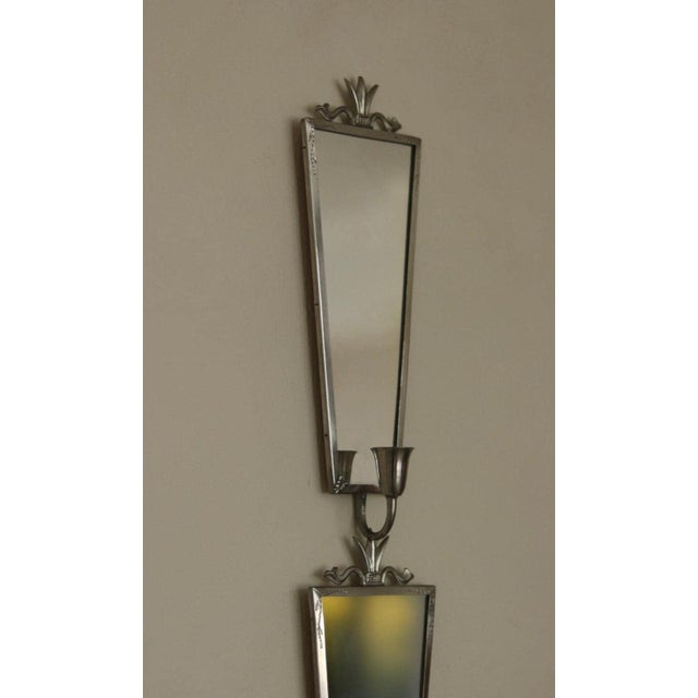 Pair of Mid Century Swedish Pewter Sconces. Beautiful pair of pewter sconces, in good vintage condition. Beautifully...