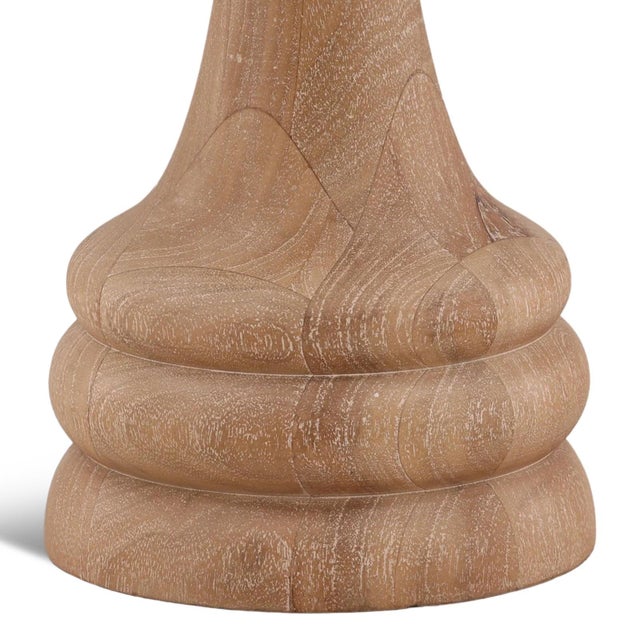 Washed finish mango wood round side table. Pedestal base with modern stacked rounded design. Each may vary in wood...