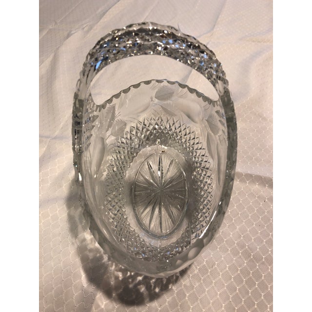 Cut crystal bowl/basket with etched pear around top edge.