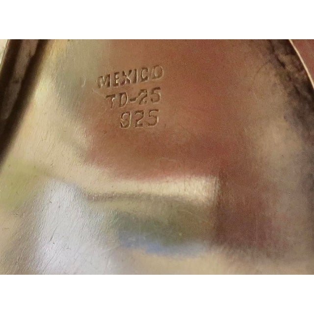 Modernist Sterling silver cuff marked 925 TD-25 Mexico. Mirror gloss measures 6.5 on gauge. The weight is 40 Dwt. The...