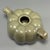 Fine antique Chinese celadon melon‑shaped ewer. Charming lobed melon form, fitted with curved handle and short spout,...
