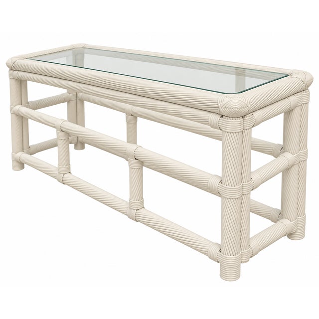 Beautiful vintage pencil reed rattan console table with glass top, professionally refinished in Benjamin Moore lacquer in...