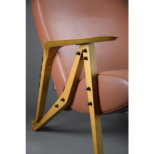 Experience timeless elegance and innovative design with the Gilda reclining armchair, an iconic creation by Carlo Mollino...