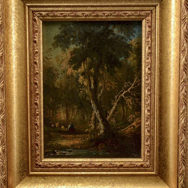 This miniature oil painting on wood, dating from the 19th century, depicts an evocative woodland landscape brought to life...