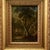 This miniature oil painting on wood, dating from the 19th century, depicts an evocative woodland landscape brought to life...