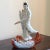 A lovely mid-20th century Chinese porcelain figure of Guan Yin -- the goddess of mercy and compassion. This delicate...