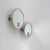 1 pair of wall mirrors, 1 x magnifying mirror, 1 x normal view, from the Art Deco period from France with lighting. The...