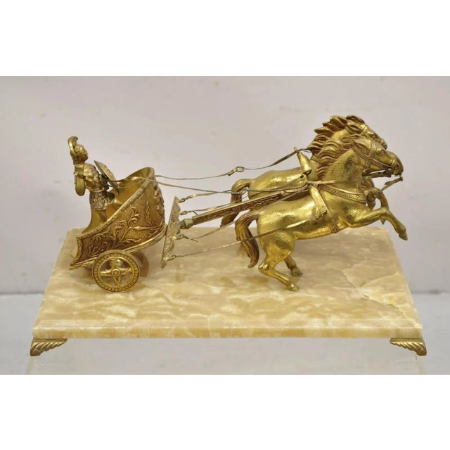 Vintage Gold Gilt Metal Roman Horse Drawn Chariot Sculpture on Marble Base. Circa Mid 20th Century. Measurements: 8.5" H x...