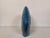 With an unstated ridged texture and a vibrant blue glaze this ceramic fish would make a wonderful accent piece for any...