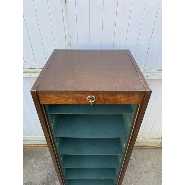 1970s oak and oak veneer tambour door filing cabinet In good overall condition, fully functional, with a few minor...