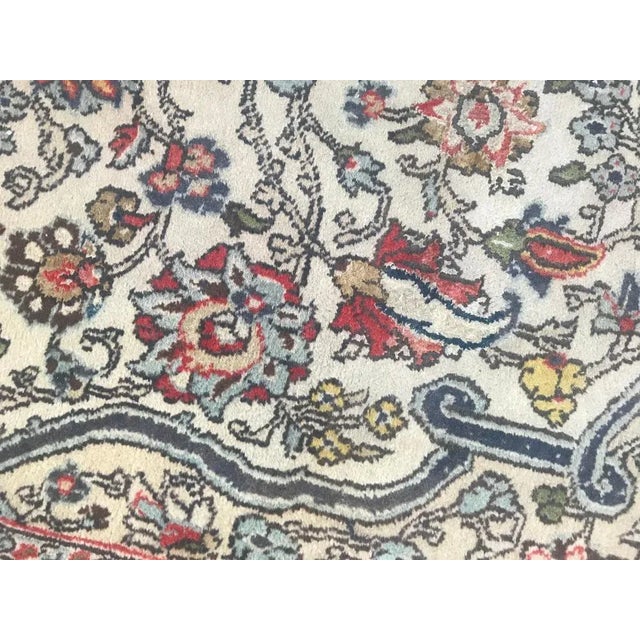 Beautiful mid-20th century rug with a beautiful design of flowers with central medallion, light colors with red, yellow...